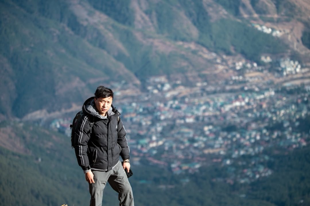 Norbu Gyeltshen on a ridge above the valley